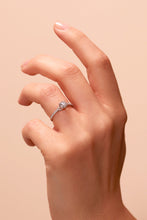 Load image into Gallery viewer, 0.50ct lab grown diamond in 9 white carat gold featuring a brilliant lab grown diamond centre with pavé set diamond shoulders shown on hand.